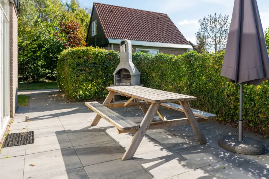 Vakantiehuis tuin barbecue picknickbank